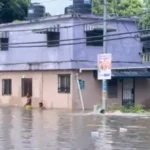 Lluvias dejan bajo agua varias calles y casas de Santo Domingo Este